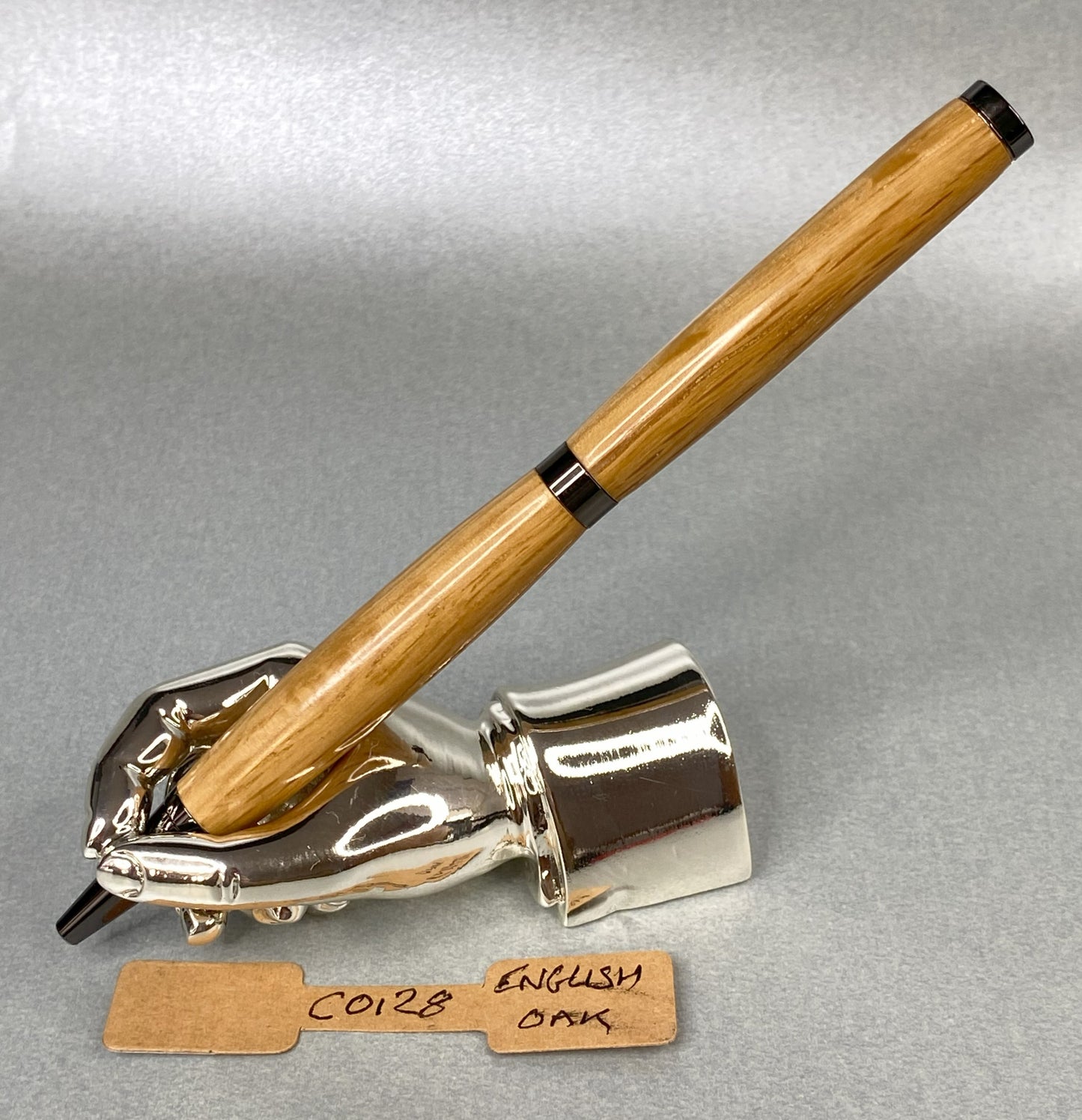 English Oak wood pen on a chrome plated right hand shape