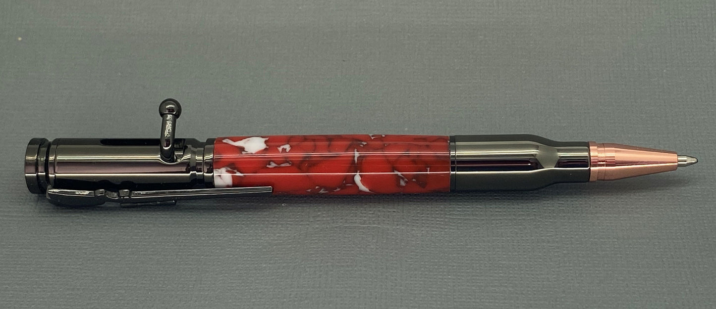 A handturned Red & White acrylic Bolt action pen 
