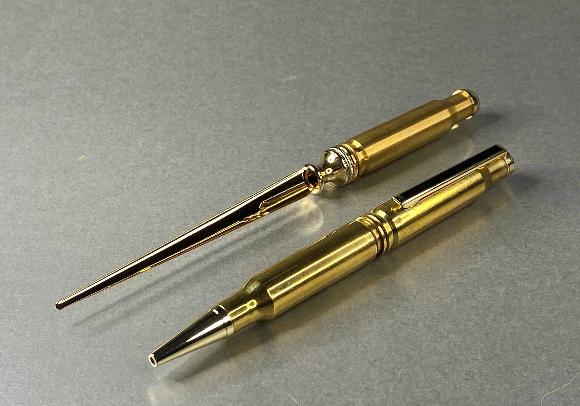Pen and a letter opener made from once fired .308 brass shell cases