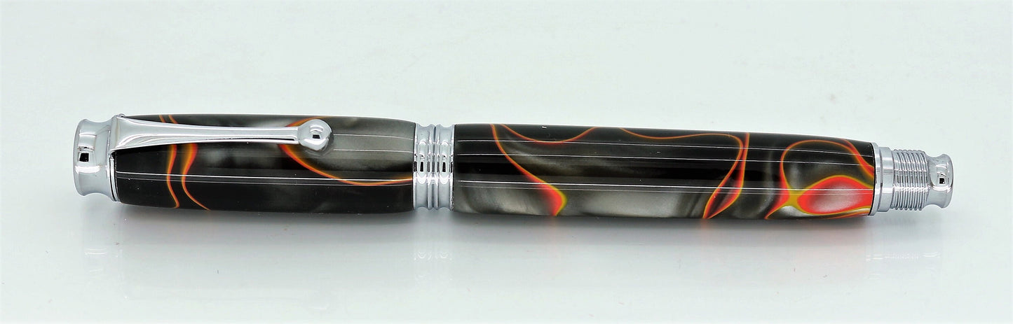 Acrylic Fountain pen  lying down, the pen has chrome plated fittings