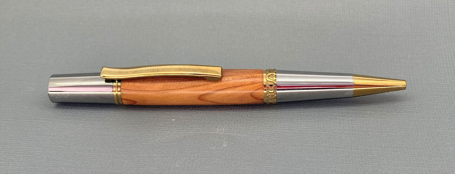 Handturned English Yew wood pen with gold and chrome plated fittings